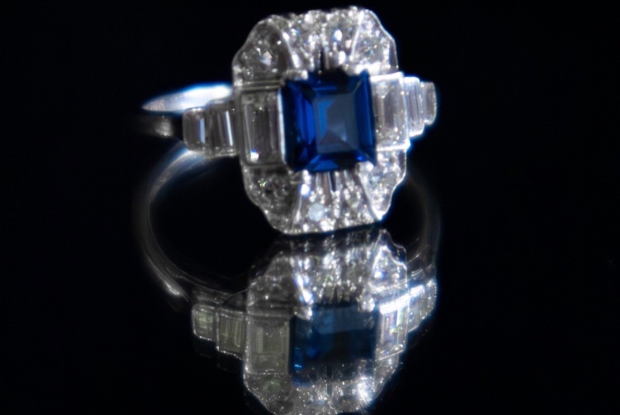 An antique square-cut sapphire and diamond ring.