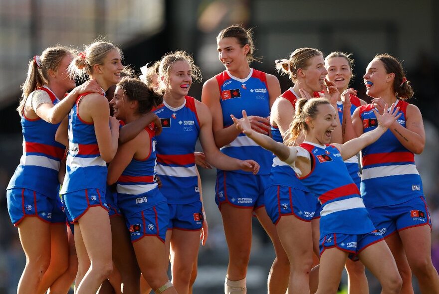 Western Bulldogs AFLW team members in a group.