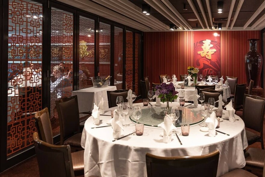 Tables set in the dining room at Red Emperor.