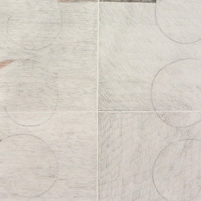 Detail of artwork with scalloped edges.