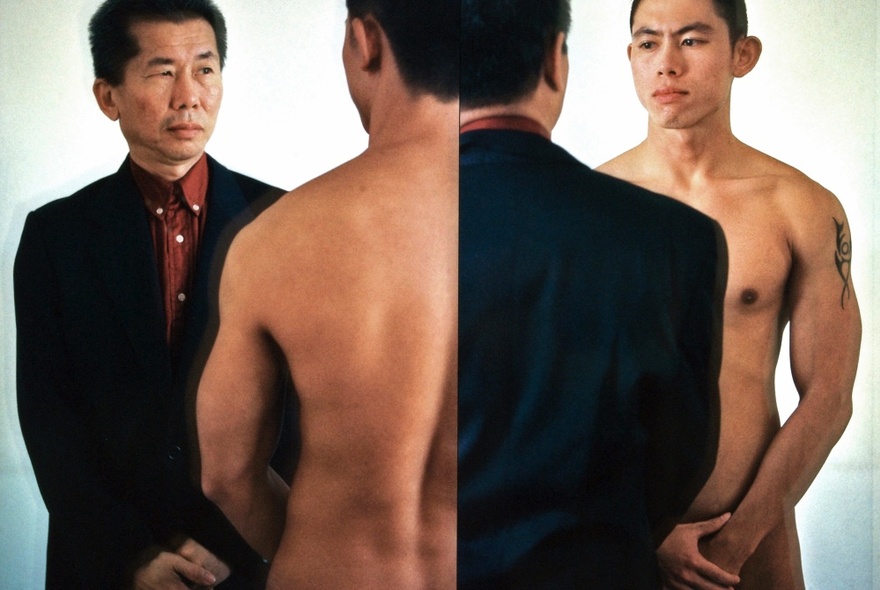 Self portrait of an artist displaying two men, one older, in a suit, and one younger, nude, simultaneously from two angles behind each of the men.