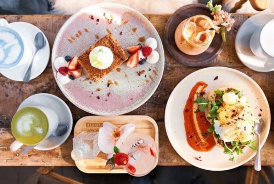 Cafe meals laid out on a table.