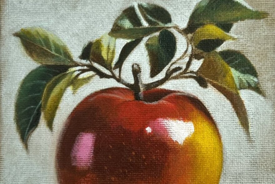 A glossy painting of an apple with leaves on its short stem.