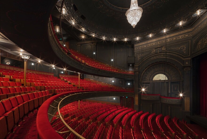 Rows of red seats in the historic Princess Theatre.