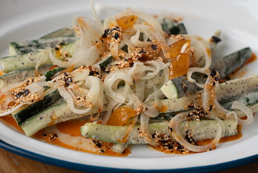 Dish of vegetables and noodles with seasoning.