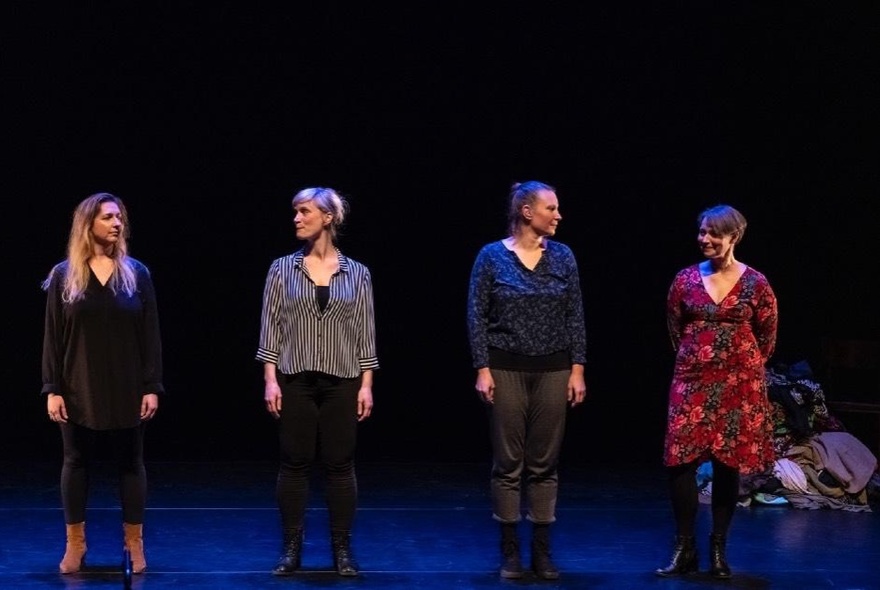 Four female improvisers on stage.