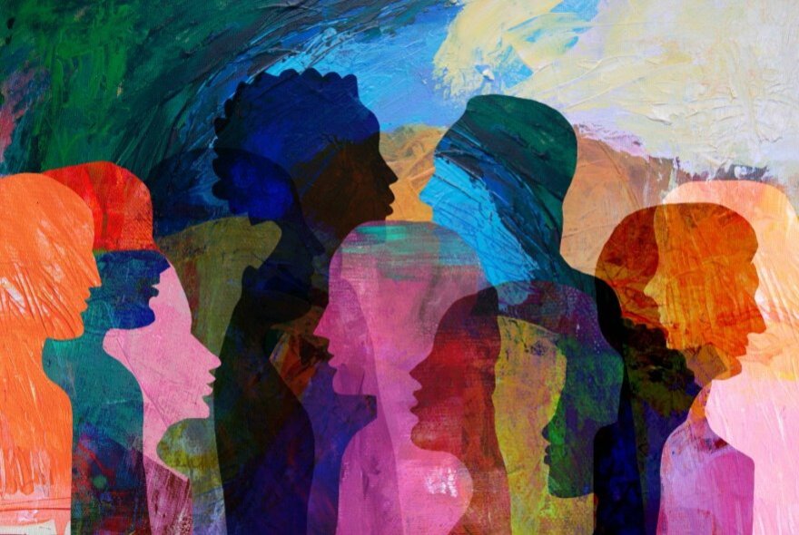 Abstract artwork of peope in profile in different colours.
