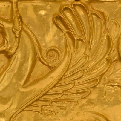 Detail from a bronze low relief frieze on display at the Hellenic Museum.