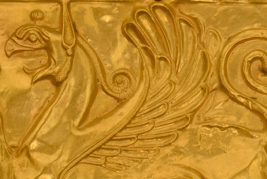 Detail from a bronze low relief frieze on display at the Hellenic Museum.