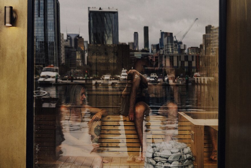 Reflections of water and city buildings.