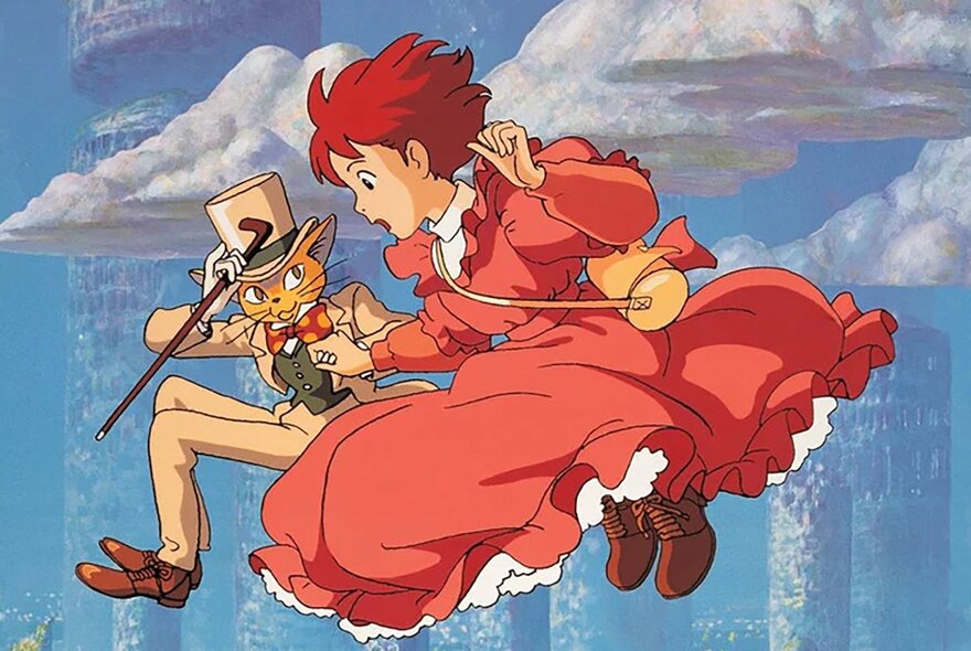 A still from a Japanese Anime movie for kids showing a young girl in a red dress leaping through the air with a cat in a top hat and tails.