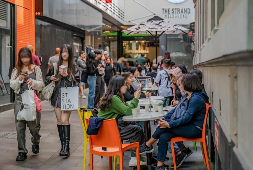 People walking down a laneway