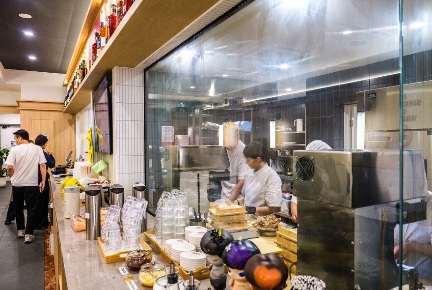 A kitchen inside a dumpling restaurant