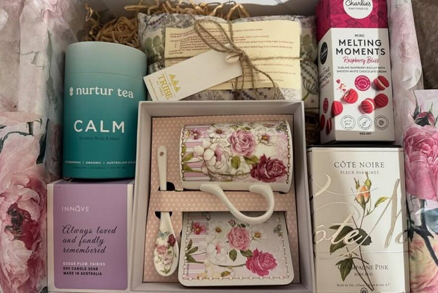 Selection of market goods including packets of teas and biscuits.