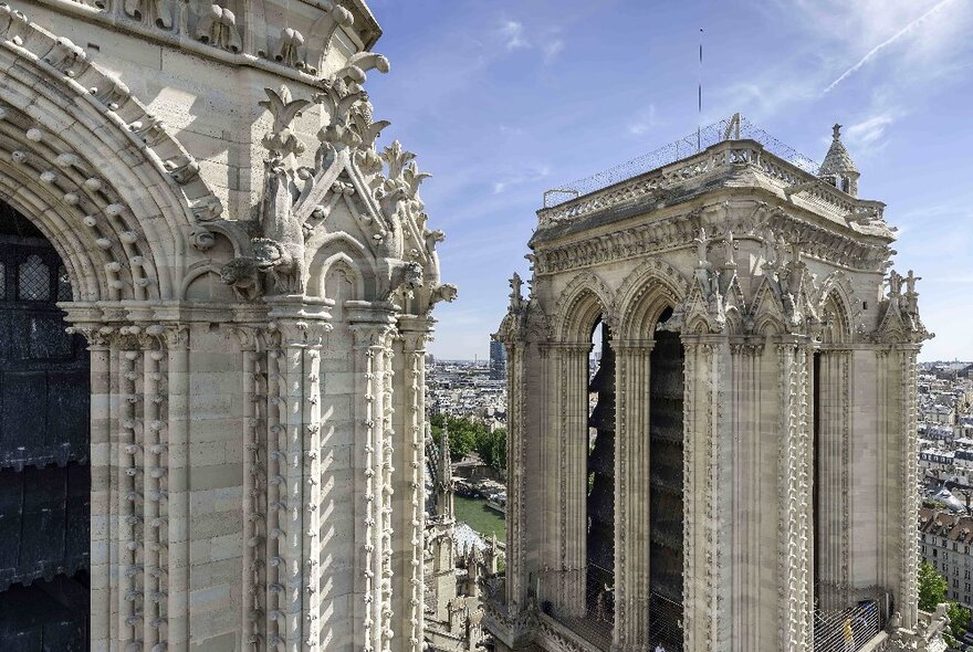 The two towers of Notre-Dame de Paris on a sunny day.