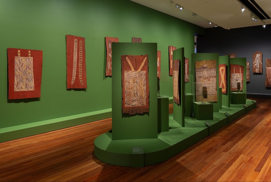 Installation view of an exhibition in a gallery featuring works by Aboriginal and Torres Strait Islander artists.