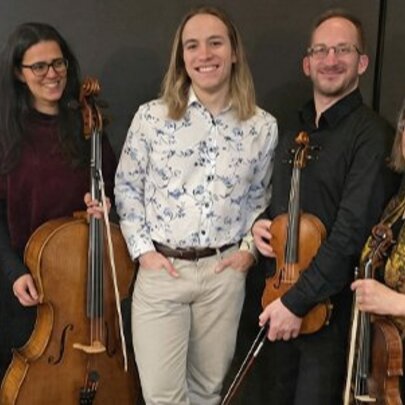 Members of the string ensemble The Crossing Machine posing with their string instruments.