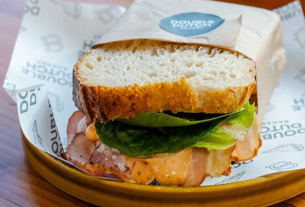 A sandwich with bacon and lettuce