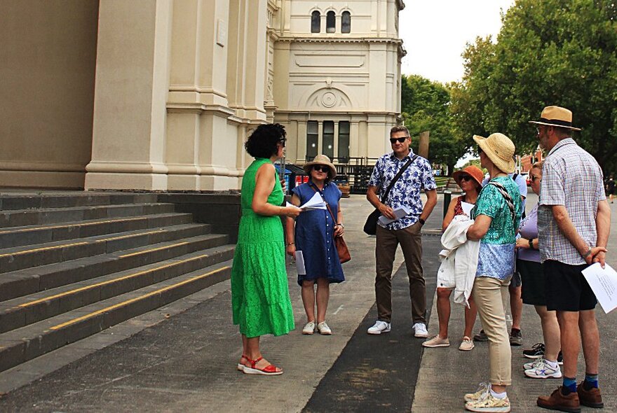 Tour group standing on the steps of the Royal Exhibition Building.