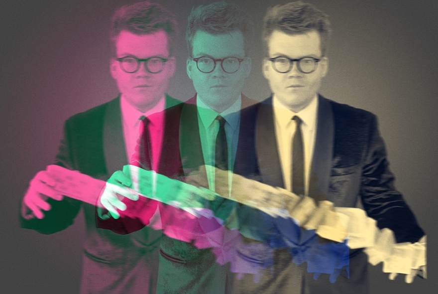 A colour-separated photograph resulting in three side-by-side images of magician/comedian Josh Staley, shuffling a deck of cards.