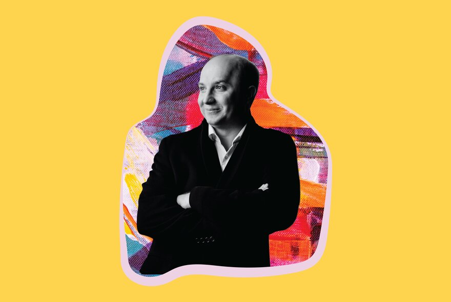 Pianist Alexander Gavrylyuk, smiling, with his arms crossed in front of his chest, set in a yellow background.
