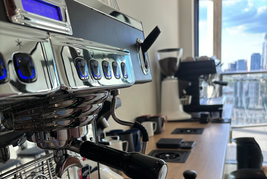A close up photograph of a professional cafe-grade espresso machine.