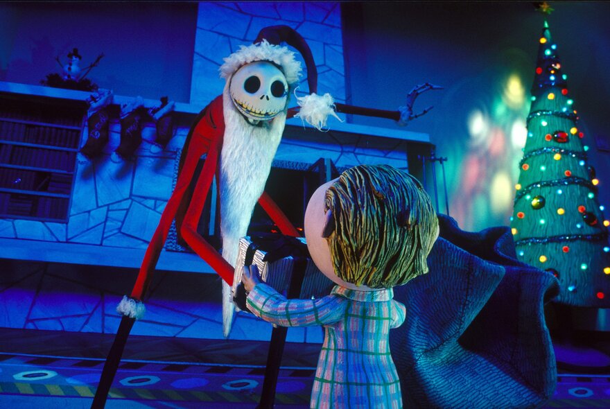 A still from the stop motion animated picture, the Nightmare Before Christmas, showing a skeleton Santa and a child.