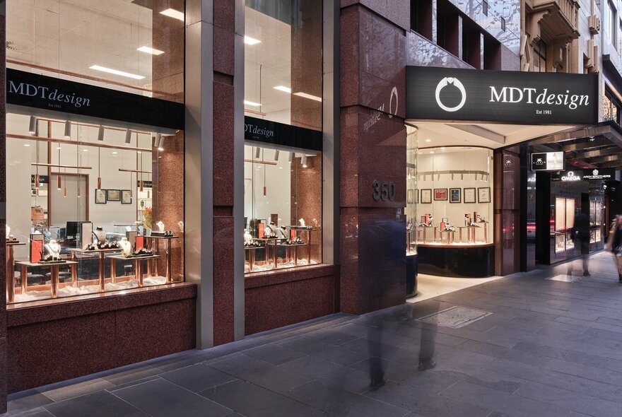 Jewellery store facade with window displays and signage.