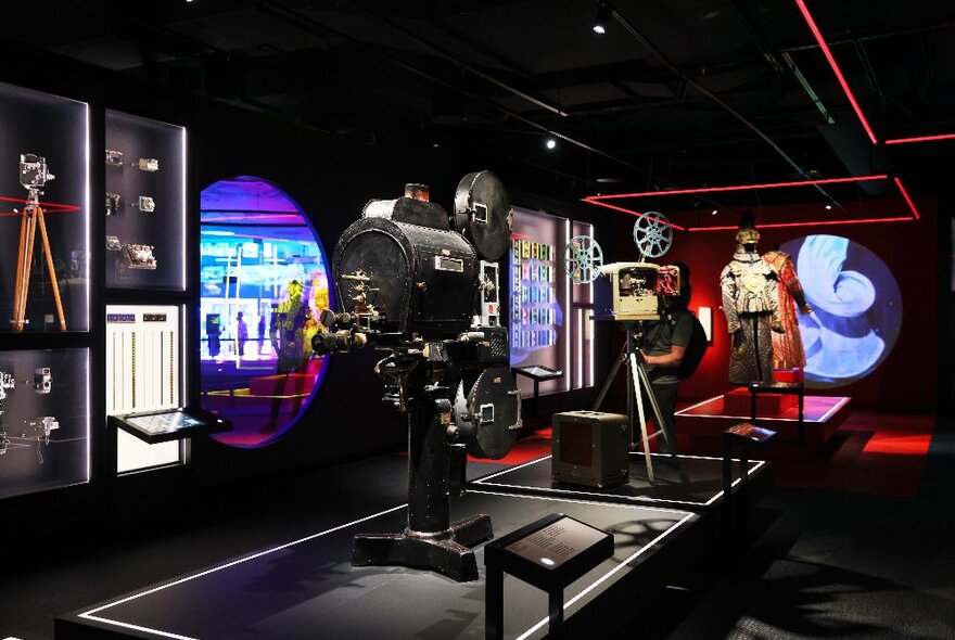 An exhibit displaying old movie cameras and projectors.