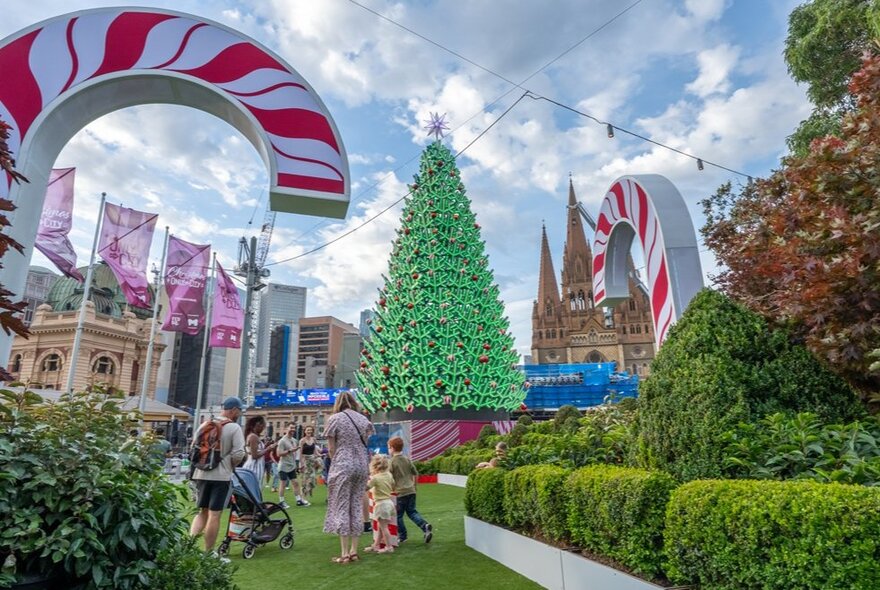 Large Christmas tree and Christmas decorations in Fed Square. 