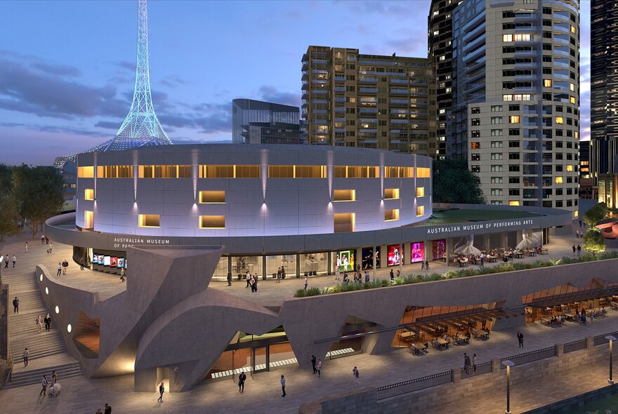 Looking at the Australian Museum of Performing Arts with the Arts Centre spire and city buildings visible in the background. 