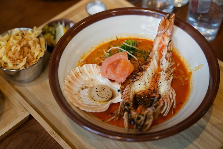 Thai dish of seafood with clam and tomato.