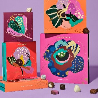 A display of chocolates and chocolate boxes.