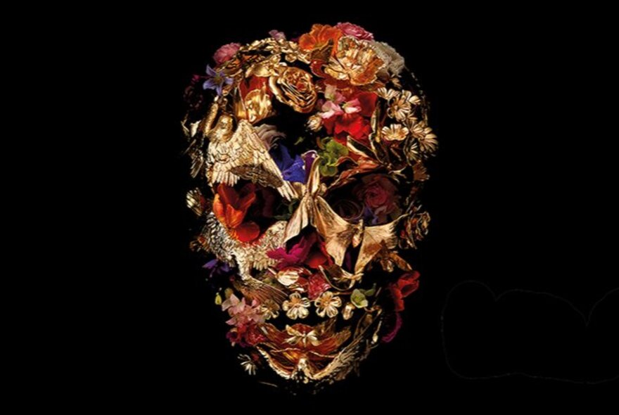 A collage mask of a human face. 