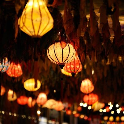 Asian-style glowing lanterns at night.