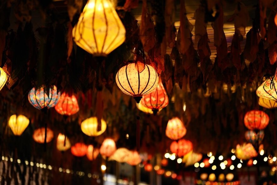 Asian-style glowing lanterns at night.