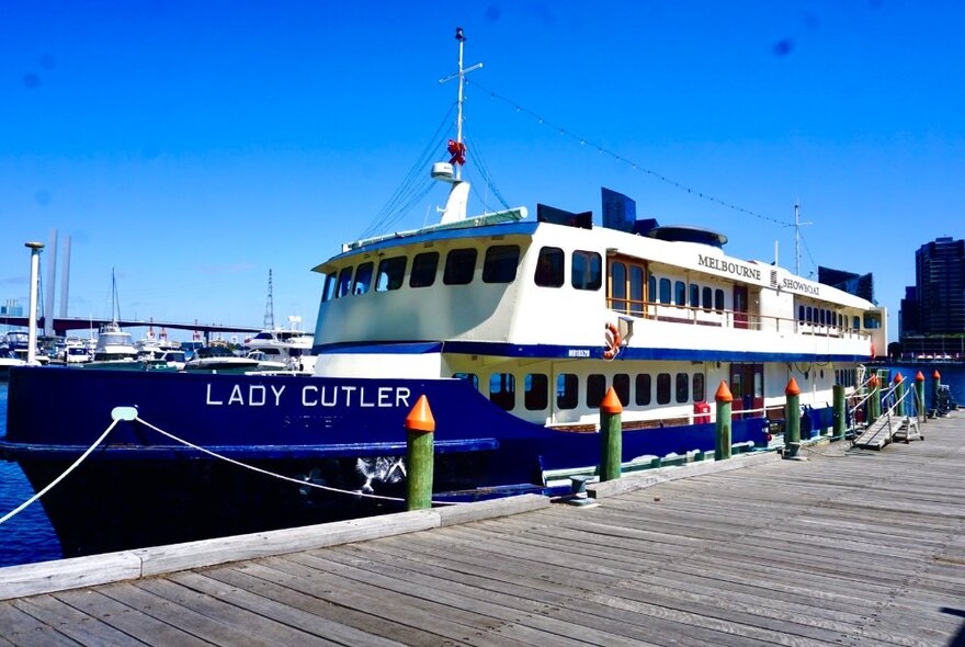 The Lady Cutler Showboat docked at a berth.