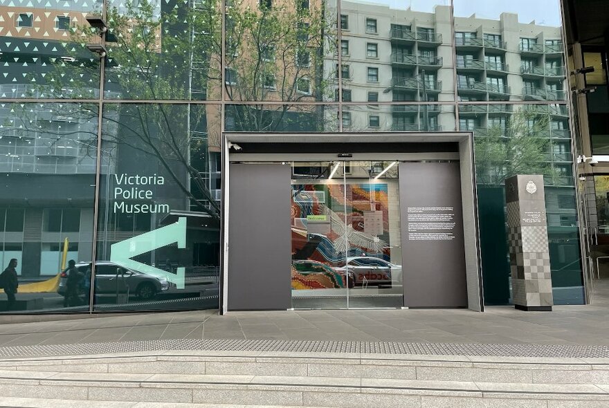 The glass-panelled entrance to the Victorian Police Museum.