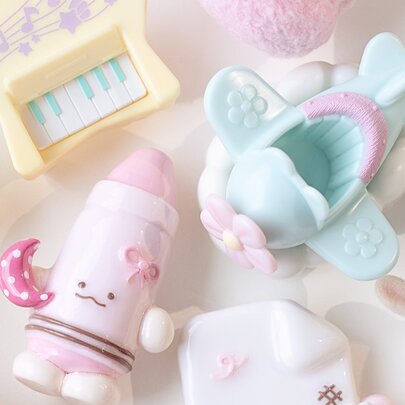 A collection of pastel-coloured cute clay trinkets.