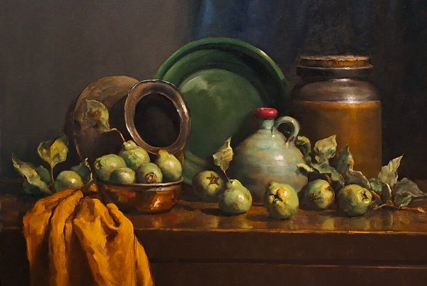 Still life oil painting of ceramic objects, fruit and fabric on a wooden sideboard. 