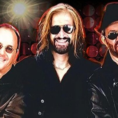 Glamourised portrait of the three key band members of the Bee Gees tribute band, BeeGees Revival, all wearing black clothes and dark glasses.