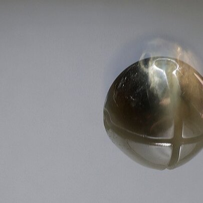 Silent Hand Catches Silver Bell