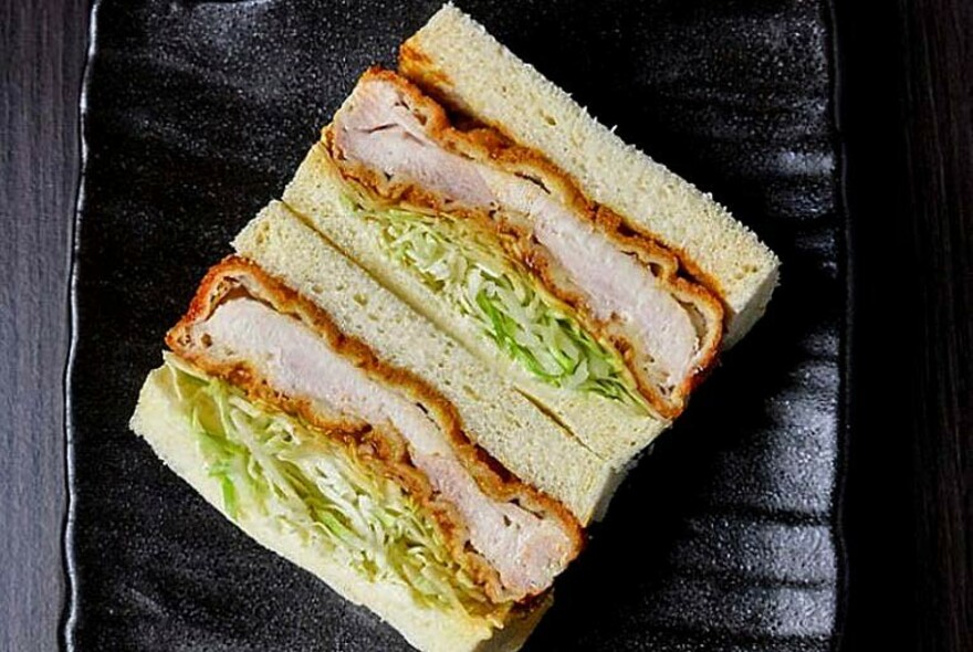 Neatly cut Japanese crispy chicken katsu sandwiches at Coppe Pan bakery. 