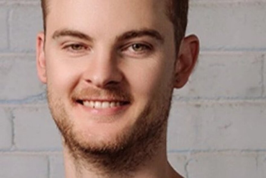 Portrait of Australian investigative reporter, Cam Wilson.