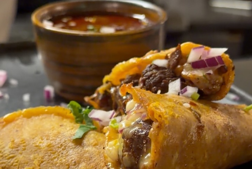 Fried Mexican tortillas with salsa.