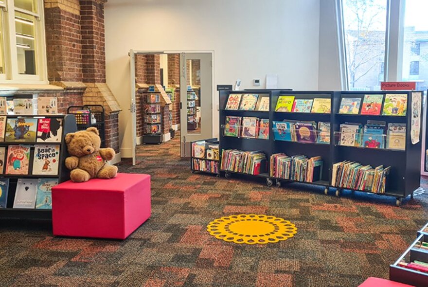 Books on shelves at Kathleen Syme Library and Community Centre.