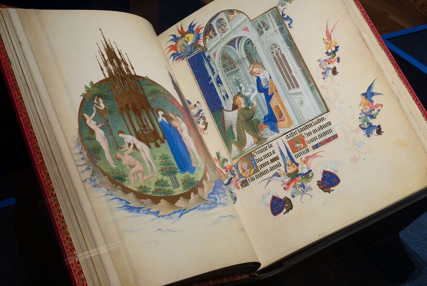An opened medieval book with a colourful illustration on each page.