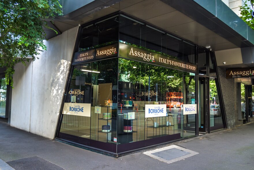 The glass fronted corner shopfront of Assaggia, Italian produce store.