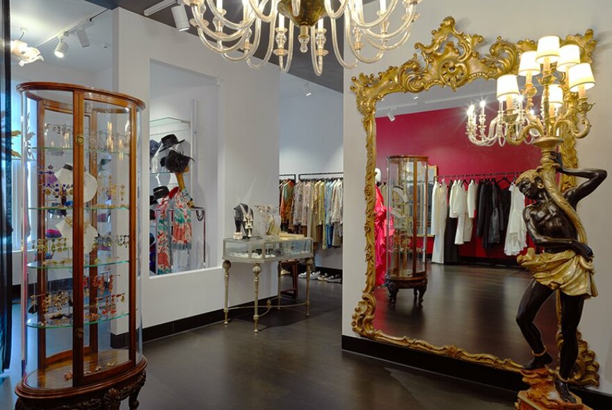 Fashion, fragrances, accessories, art and antiques in Christine on Collins store. 