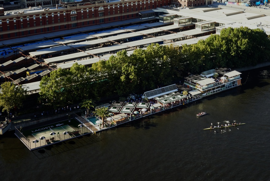 Aerial view of Arbory Afloat with an extended tennis court added to the left. 